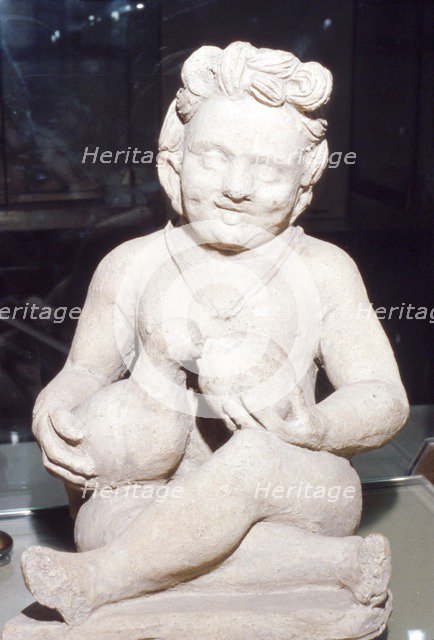 Terracotta Etruscan Votive of Child Feeding Bird, from Vulci, c2nd century BC. Artist: Unknown.