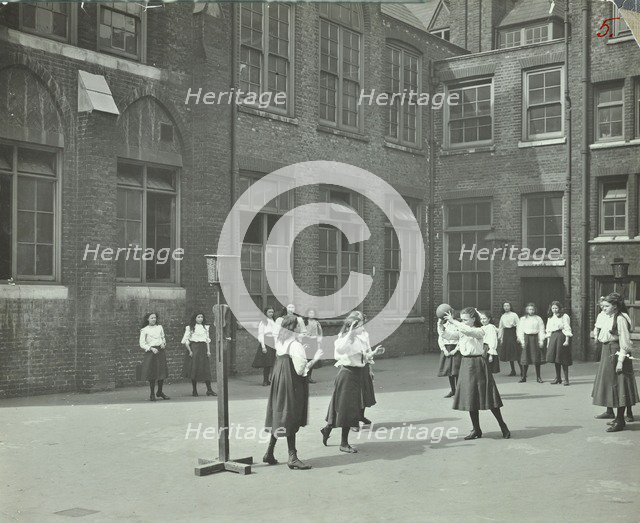 Girls playing netball in the playground, William Street Girls School, London, 1908. Artist: Unknown.