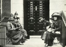 Suffragettes waiting on the doorstep of Sir Edward Carson's London home, 6 April 1914, (1947). Creator: Unknown.