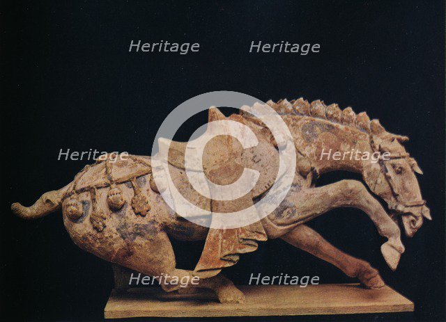 'Pottery Figure of a Horse - T'Ang Dynasty', c7th to 10th century AD, (1936). Artist: Unknown.