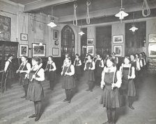 Students in the gymnasium, Ackmar Road Evening Institute for Women, London, 1914. Artist: Unknown.