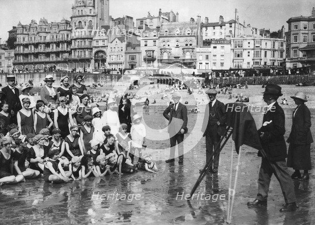 Photographer taking a seaside snap, c1900-1919(?). Artist: Unknown