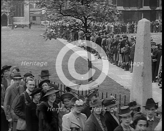 British People Lining the Streets Outside Westminster Abbey To Join the National Day of..., 1940. Creator: British Pathe Ltd.