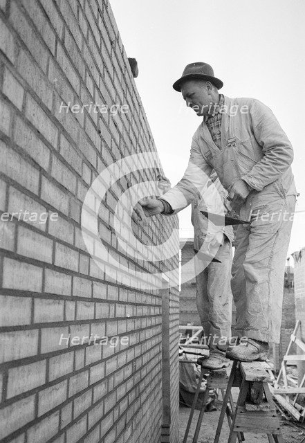 A bricklayer at work, Landskrona, Sweden, 1965. Artist: Unknown