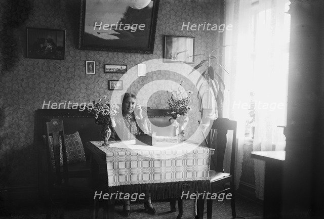 Woman listening to her crystal radio set, Sweden, 1927. Artist: Unknown