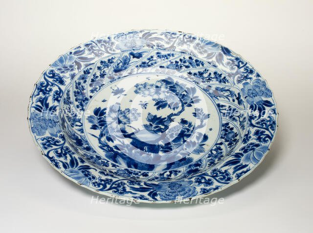 Deep Dish with Peony, Pine Branches, Plum Blossoms, Chrysanthemum..., Qing dynasty, 19th cent. Creator: Unknown.