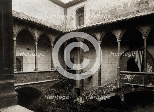 Hospital de la Santa María, Lérida: view of the staircase to the courtyard, c1900. Creator: Unknown.
