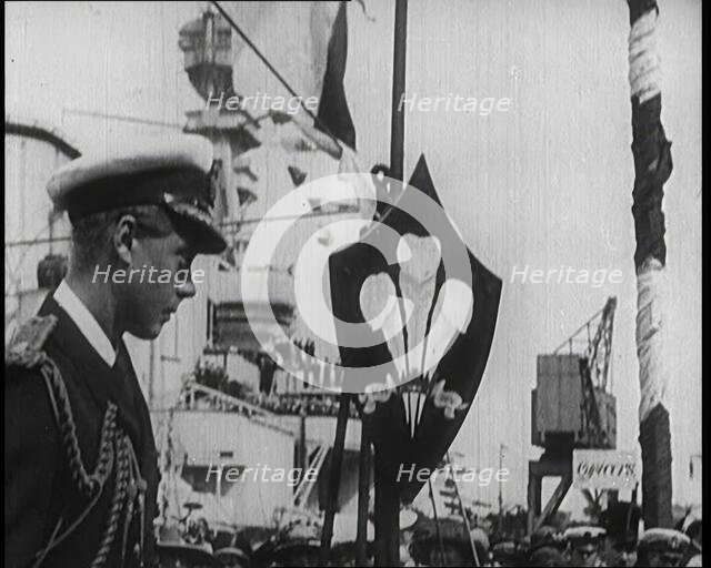 Edward, Prince of Wales, Stood on a Dock, With a Large Ship Behind Him, 1922. Creator: British Pathe Ltd.