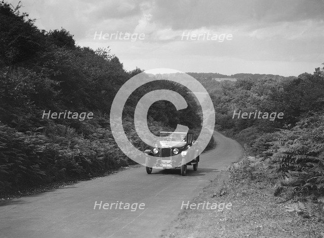 Austin 12/4 taking part in a First Aid Nursing Yeomanry trial or rally, 1931. Artist: Bill Brunell.