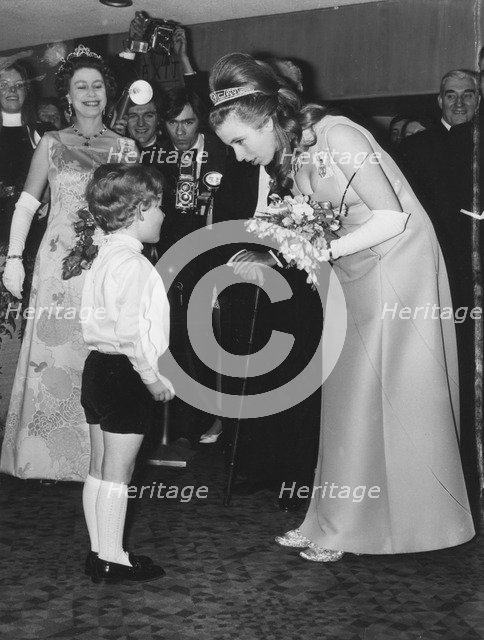 The Queen and Princess Anne attending a film performance, Odeon Theatre, Leicester Square, 1970. Creator: Unknown.