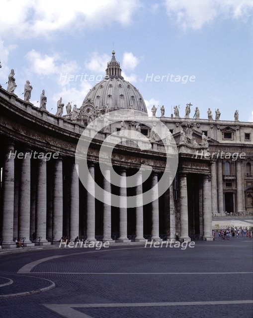 Square of San Pedro, detail of the colonnade designed by Bernini between 1655-1667, at back the B…