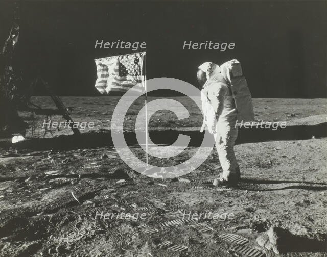 Buzz Aldrin on the Moon with the American Flag, 1969. Creator: Neil Armstrong.
