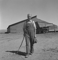 Chris Ament, on dry land wheat farm of Columbia Basin where..., south of Quincy, Washington, 1939. Creator: Dorothea Lange.