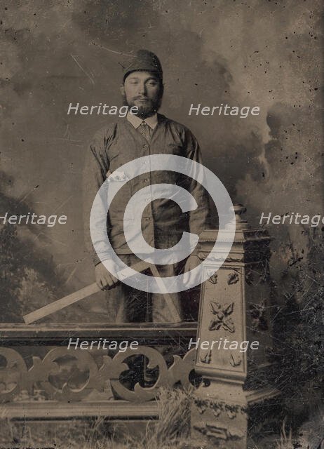 Carpenter, Standing Behind a Decorative Balustrade, Holding a Square, 1870s. Creator: Unknown.