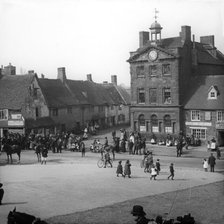 Town street scene - Plume of Feathers Inn, possible Dorset England, c1900s. Creator: Robert Augustus Henry L'Estrange.