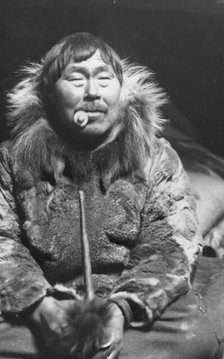 Eskimo smoking pipe, between c1900 and c1930. Creator: Unknown.