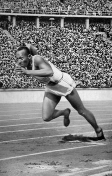 Jesse Owens at the start of the 200 metres at the Berlin Olympic Games, 1936. Artist: Unknown