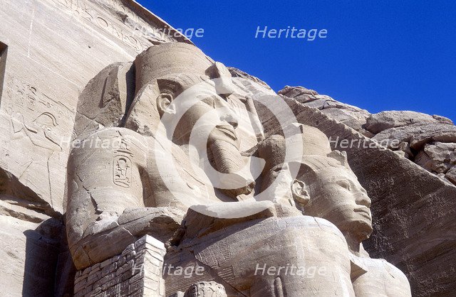 Statues of Rameses II, in front of the main temple, Abu Simbel, Egypt, early 13th century BC. Artist: Unknown