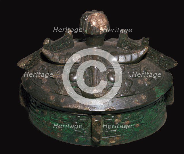 Chinese bronze lid of a wine-vessel, 11th century BC.h Artist: Unknown