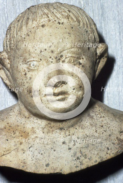 Roman Pipeclay Head of Child from Roman grave at Colchester, Essex, c2nd-3rd century. Artist: Unknown.