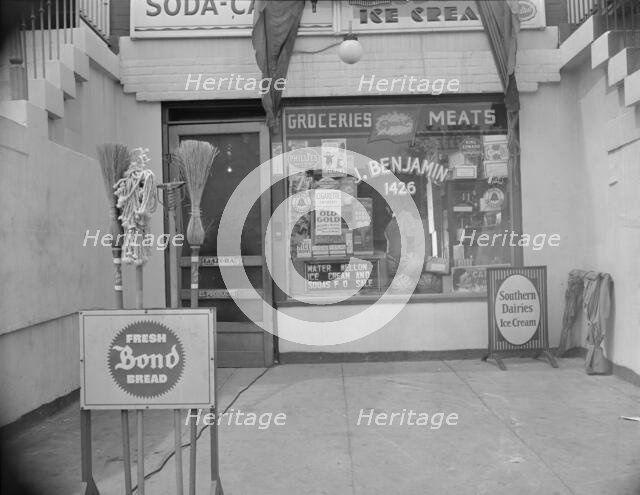 Grocery store across the street from Mrs. Ella Watson..., Washington, D.C., 1942. Creator: Gordon Parks.