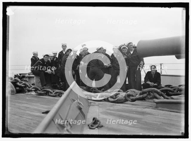 Cleaning 12' gun, between 1910 and 1920. Creator: Harris & Ewing.