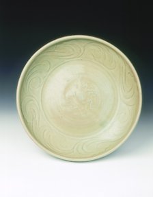 Celadon dish with moulded tree and incised scrolls, Yuan-Ming dynasty, China, 14th century. Artist: Unknown