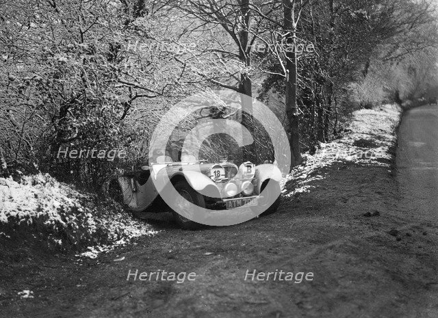 SS Jaguar 100 taking part in a motoring trial, late 1930s. Artist: Bill Brunell.