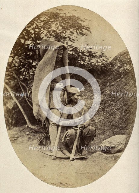 Nepal: two Tibetan men with pick-axes, c1860. Creator: Clarence Comyn Taylor.