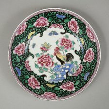 European copy of famille noire plate with cockerel looking at a butterfly, 20th century. Artist: Unknown.