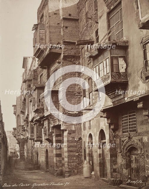 Street in the Area of Ibn Tulun Mosque, Cairo, 19th century. Creator: Maison Bonfils.