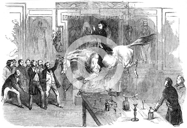 Daring leap in the dining room of the White Hart Hotel, Aylesbury, Buckinghamshire, 19th century. Artist: Unknown