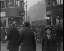 People Walking Around the Streets of London, 1930s. Creator: British Pathe Ltd.