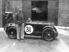Cyril Paul with his MG C type, 1932. Artist: Unknown