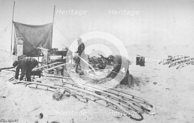 'Fitting the Hand-Sledges with Runners. July, 1895', (1897). Artist: Unknown.