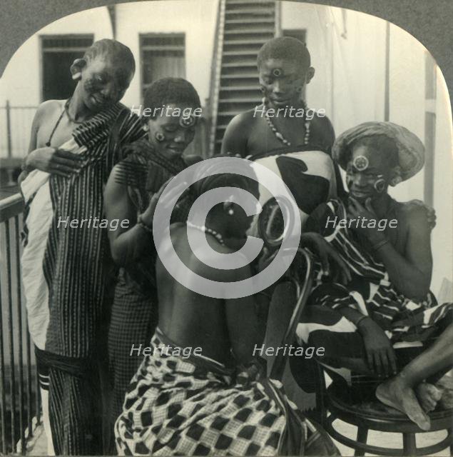 'A Beauty Parlor on  Zanzibar, Africa - Swahili women take care of their hair', c1930s. Creator: Unknown.