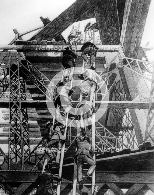 Gentlemen of the press taking the stairs on the Eiffel Tower, Paris, 1888. Artist: Unknown