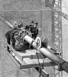 Putting wire wrapping around the suspension cables, Brooklyn Suspension Bridge, 1883. Artist: Unknown