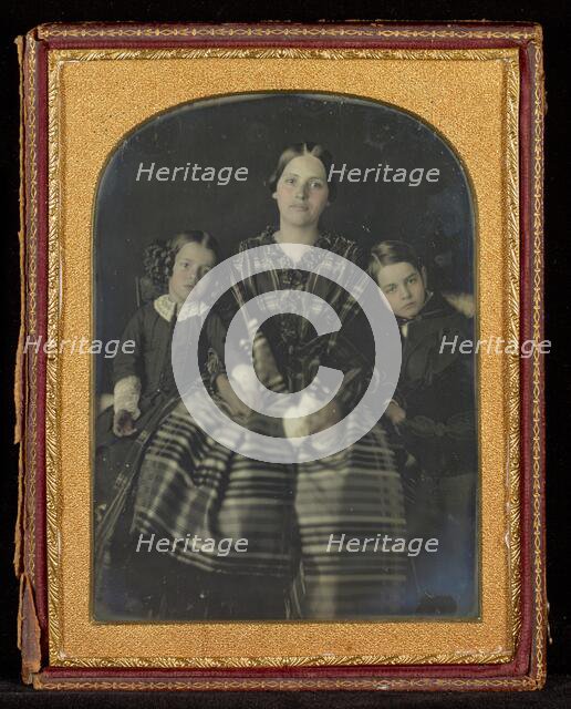 Portrait of a Seated Woman with a Young Girl and Boy on Either Side, about 1850s. Creator: Unknown.