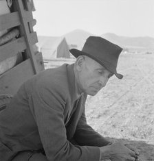 Former Nebraska farmer, now a migrant farm worker, Klamath County, Oregon, 1939. Creator: Dorothea Lange.