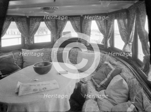 Cruising in comfort, the saloon of motor yacht 'Scaramouche', 1927. Creator: Kirk & Sons of Cowes.