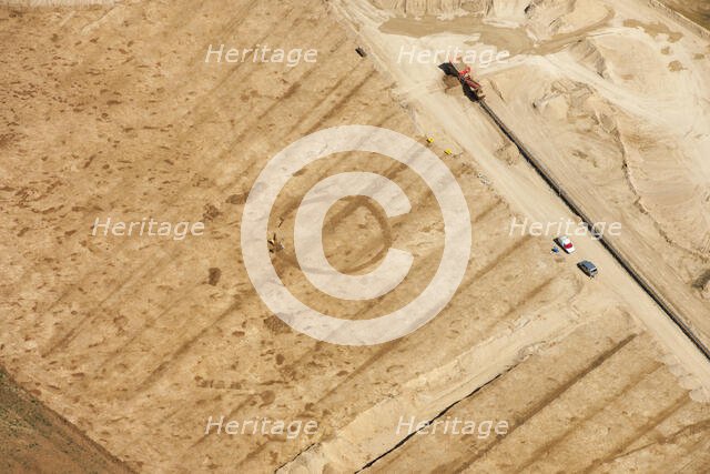 Soilmark of a possible Bronze Age round barrow, near Siddington, Gloucestershire, 2015. Creator: Historic England.