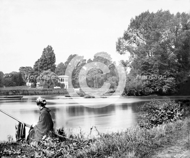 Woman waiting for the Rails Head Ferry on the River Thames, Isleworth, London, c1860-c1899. Artist: Henry Taunt.