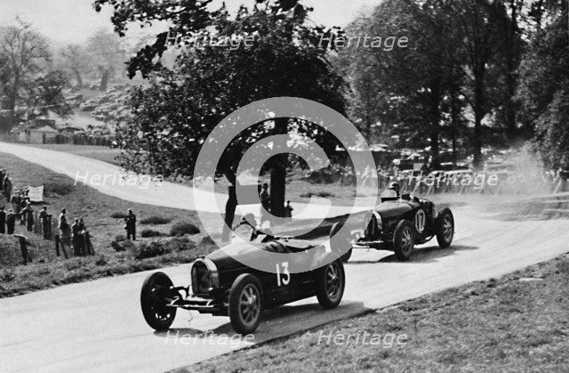 'Thrilling racing in rural England: Bugattis at Donington', 1937. Artist: Unknown.