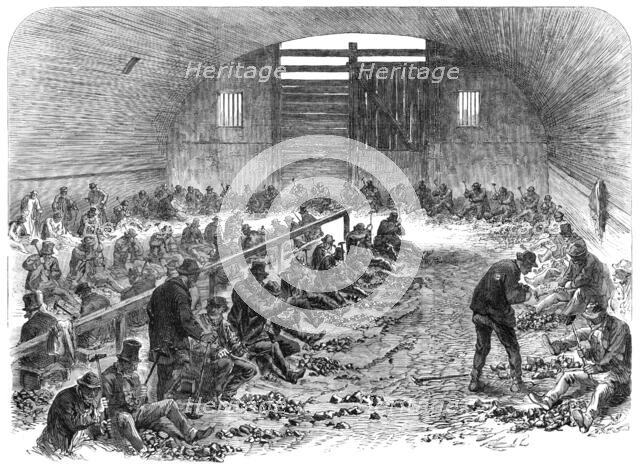 The Distress in East London: the labour-yard of the Bethnal Green Employment Association, 1868. Creator: Unknown.