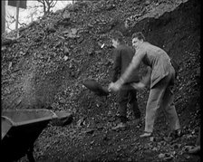 Volunteer Male Civilians Shovelling Coal, 1926. Creator: British Pathe Ltd.