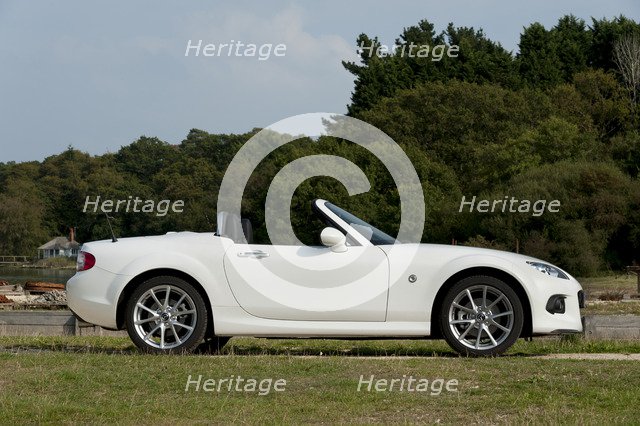 2014 Mazda MX5 Roadster Coupe Artist: Unknown.