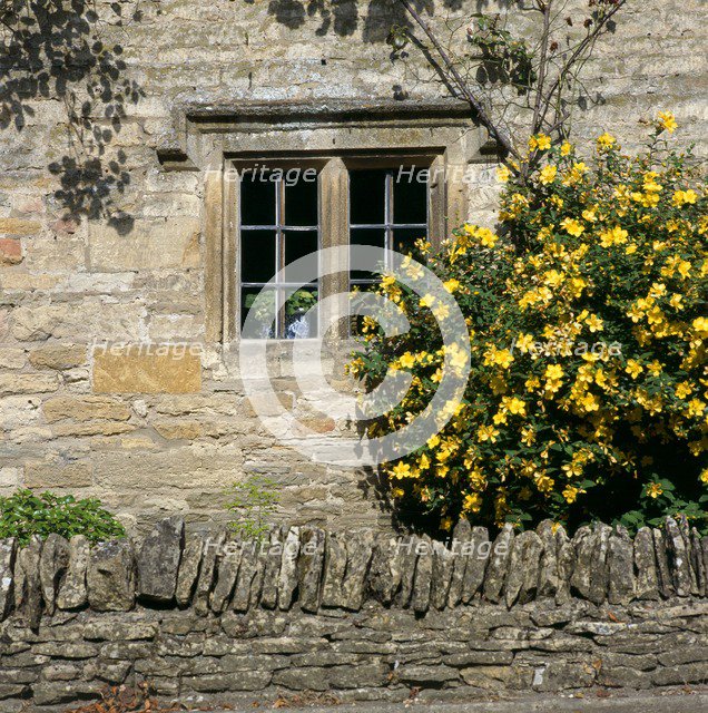 Stone mullioned cottage window, Lower Slaughter, Cotswolds, Gloucestershire, c2000s(?). Artist: Historic England Staff Photographer.