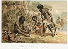 Australian natives preparing meal from an animal they have hunted, c1895. Artist: Unknown