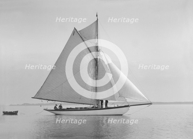 The cutter 'Wenda' in light winds, 1912. Creator: Kirk & Sons of Cowes.